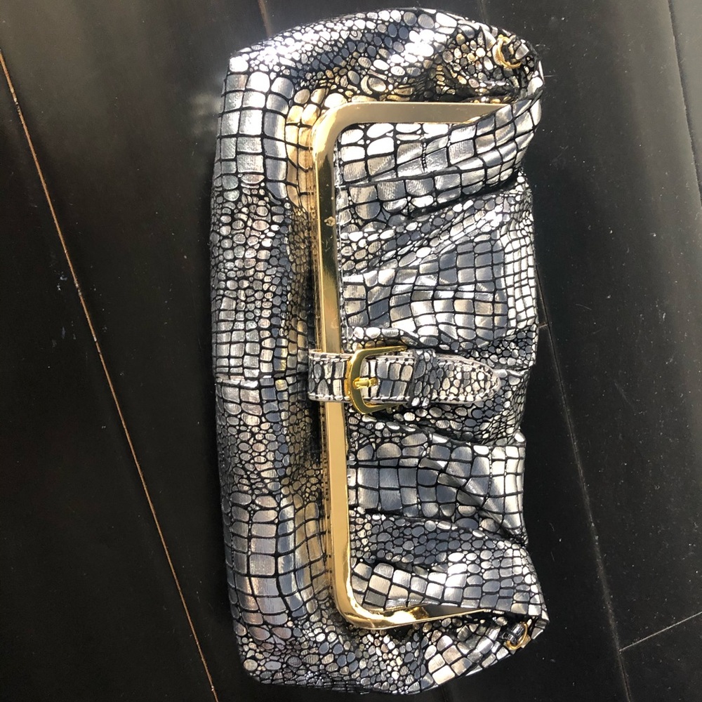 Fold over clutch with long strap available